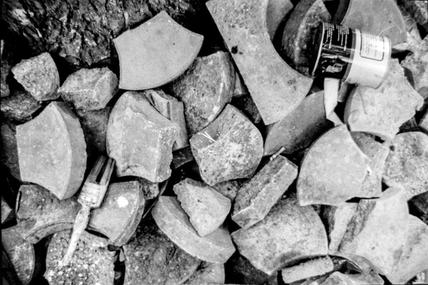 I liked the imagery of paint brush and paint bottle being thrown diagonally