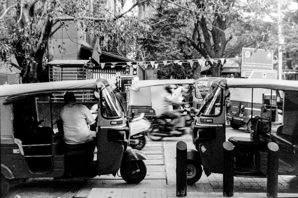 I was waiting there for 10 minutes to capture something interesting that was framed by two autos - but I lost the moment, and the auto driver came in and sat - and I clicked, giving up - but the image somehow works!