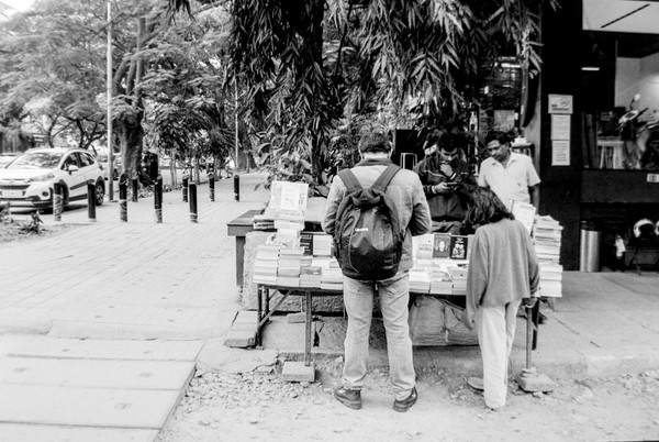 I am assuming a parent and kid - I found it cute that they were shopping for book together