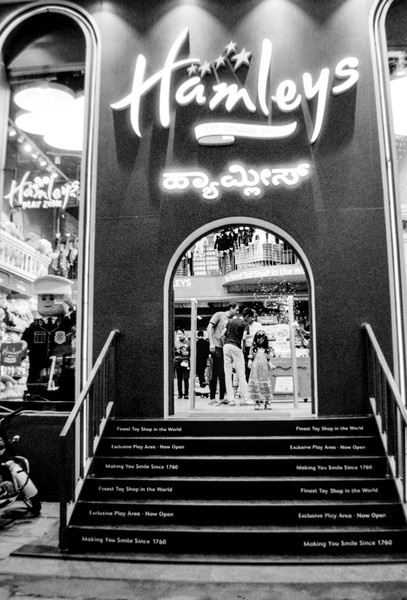 Kid playing with bubbles in Hamleys